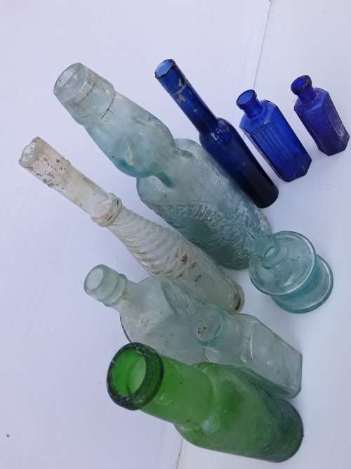 Crystal Springs Codd bottle and other antique bottles