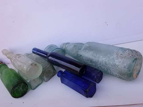 Crystal Springs Codd bottle and other antique bottles