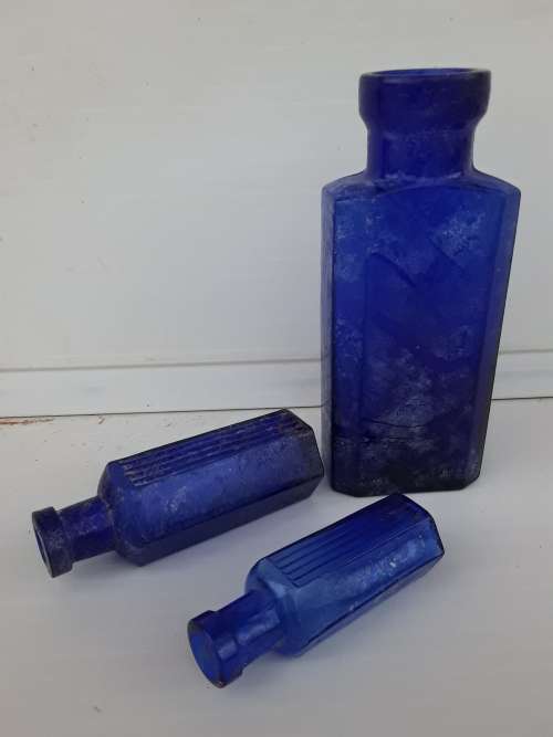 Otto Landsberg and two Not to be taken bottle made in Japan cobalt blue bottles