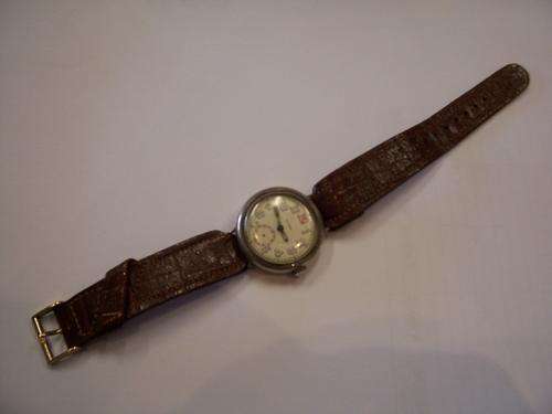 1918 Gents Cyma Wristwatch with Leather Strap and sold silver back