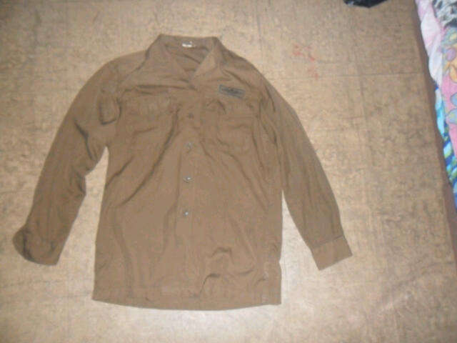 a Browns para-jacket as used in the Bush War - size med. Used by a guy in the 44 Para.