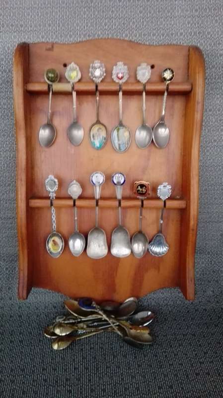 23 spoons 12 on display 4 are 24ct gold plated most are in good nic.