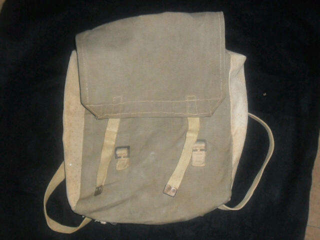 Back Pack - This nice back pack was used in WW2. A few stains from old age.