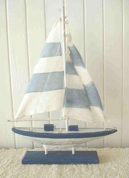 Blue sailboat on stand