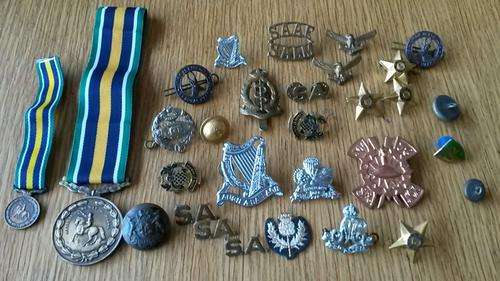 2x De Wet decoration medals plus a great collection of various SA badges.