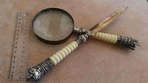 Old magnifying glass & letter opener.