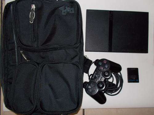 Playstation 2 console with bag