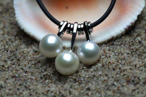 three of 8 - 9 mm pearl necklace