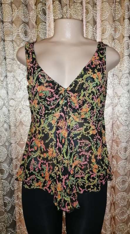 Black top with colored patterns