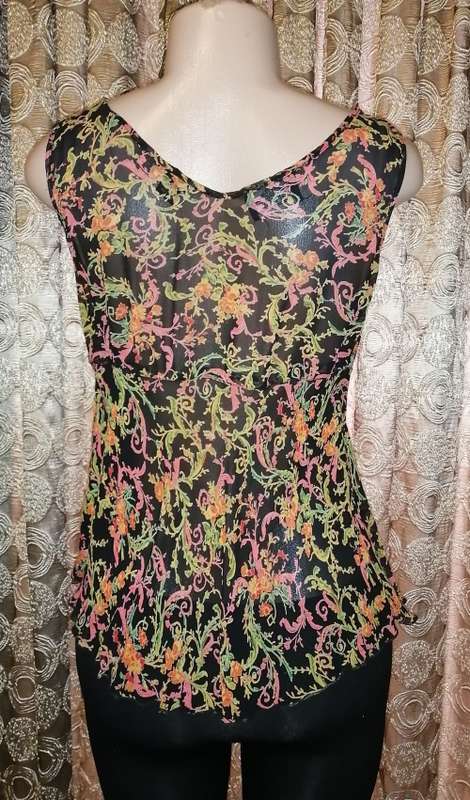 Black top with colored patterns