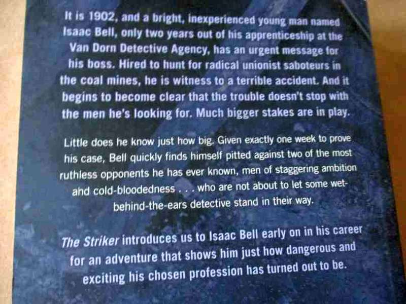 THE STRIKER - CLIVE CUSSLER AND JUSTIN SCOTT - AN ISAAC BELL ADVENTURE
