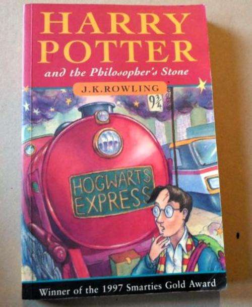 HARRY POTTER AND THE PHILOSOPHER'S STONE - J.K. ROWLING