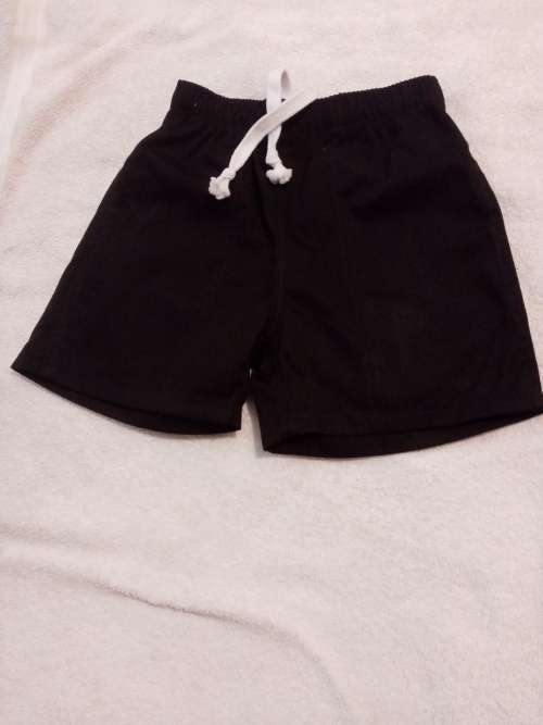 Black PT shorts 7-8 years