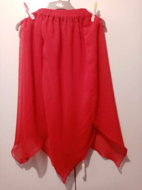 Red as symmetrical overskirt 34-36