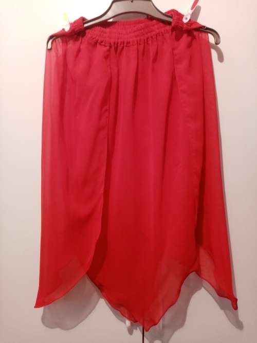 Red as symmetrical overskirt 34-36