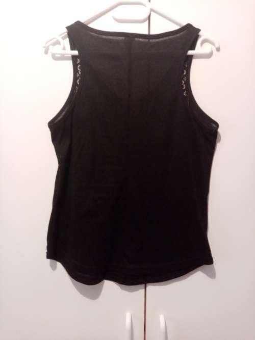 Black printed sleeveless top 32