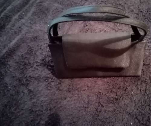 Black evening bag with sling