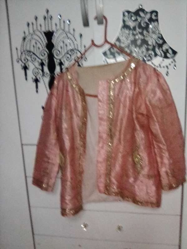 Stunning light pink lined and netted Indian outfit
