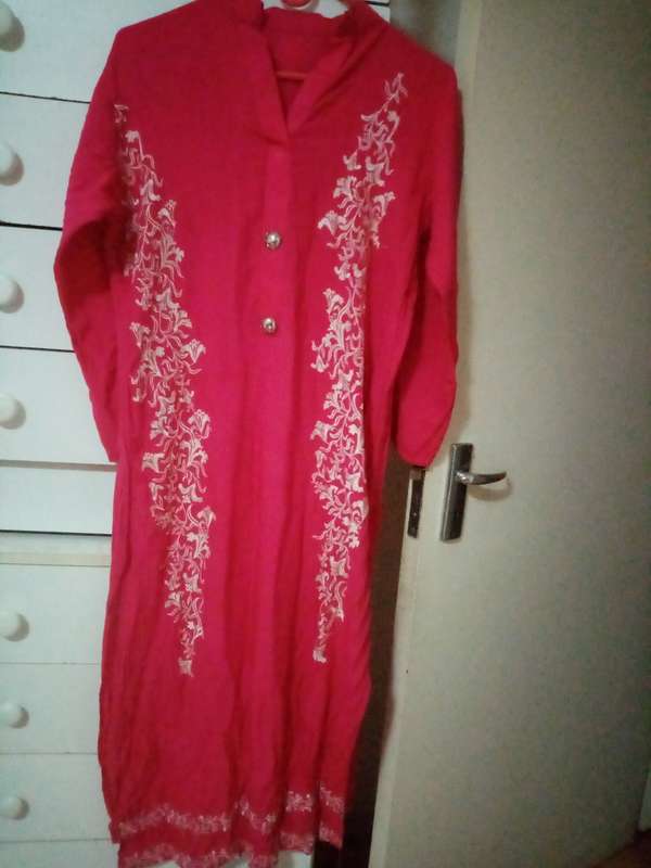 Bright pink embroidered Indian dress