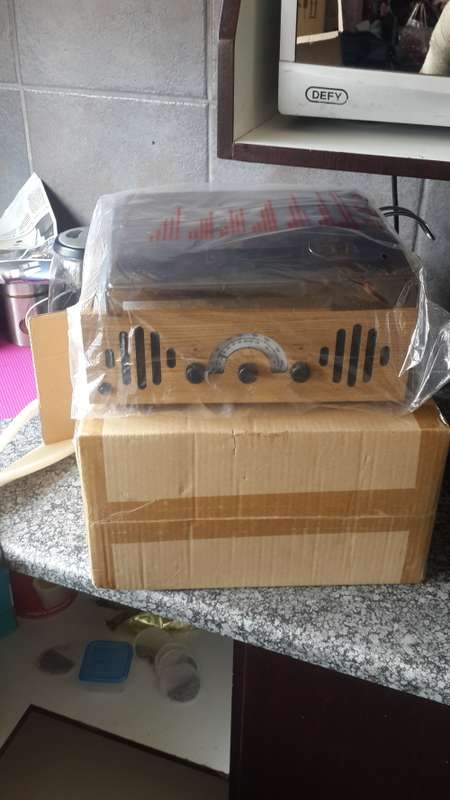 brand new record plate player with fm radio with box massive bargain!!