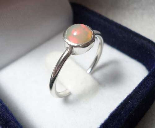 Genuine ETHIOPIAN OPAL SET IN SOLID STERLING with Nice Flashes