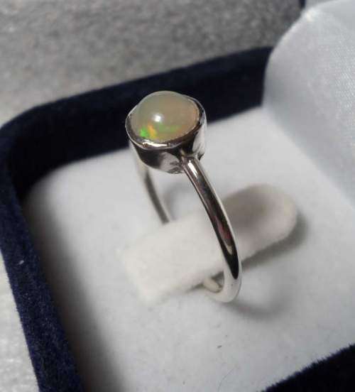 Genuine ETHIOPIAN OPAL SET IN SOLID STERLING with Nice Flashes