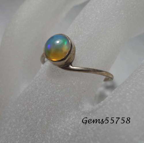 Genuine ETHIOPIAN OPAL SET IN SOLID STERLING with Nice Flashes