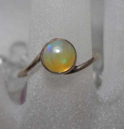 Genuine ETHIOPIAN OPAL SET IN SOLID STERLING with Nice Flashes
