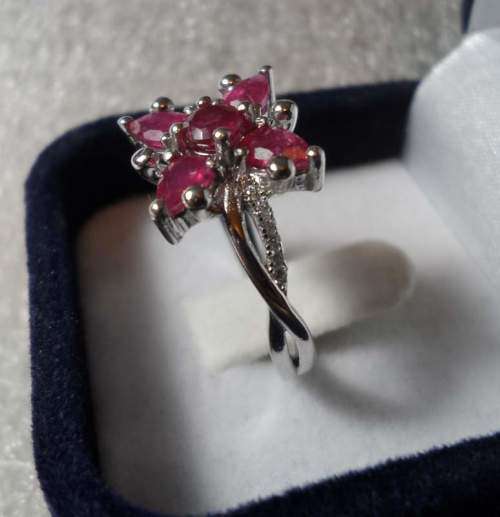 FLOWER STYLE RUBY RING SET IN SOLID STERLING