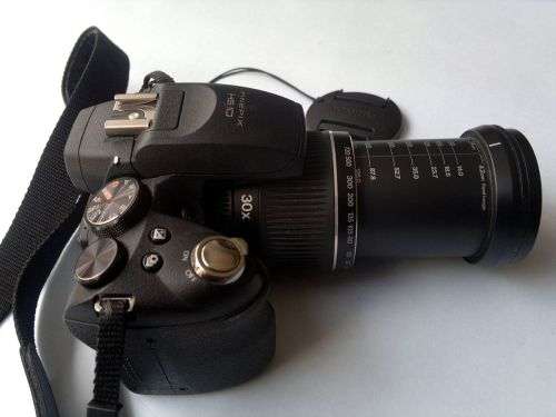 Fujifilm FinePix HS10 10 MP CMOS Digital Camera with 30x Wide Angle Optical Zoom and 3-Inch LCD