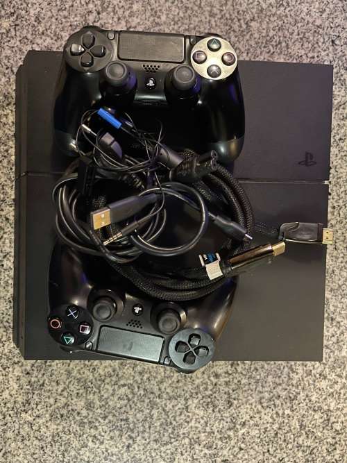 SONY PLAYSTATION 4  1TB WITH 2 CONTROLLERS and 6 GAMES