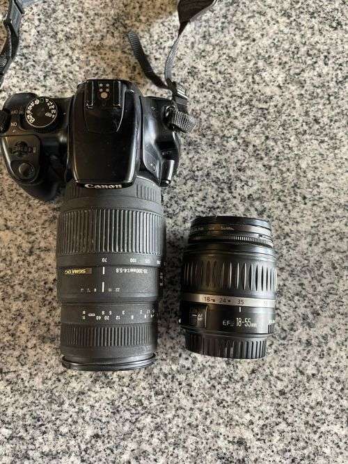Canon EOS 400D CAMERA + SIGMA 18-55mm Lens,SIGMA 70-300MM LENS and EXTRA BATTERY PLUS EXTRAS