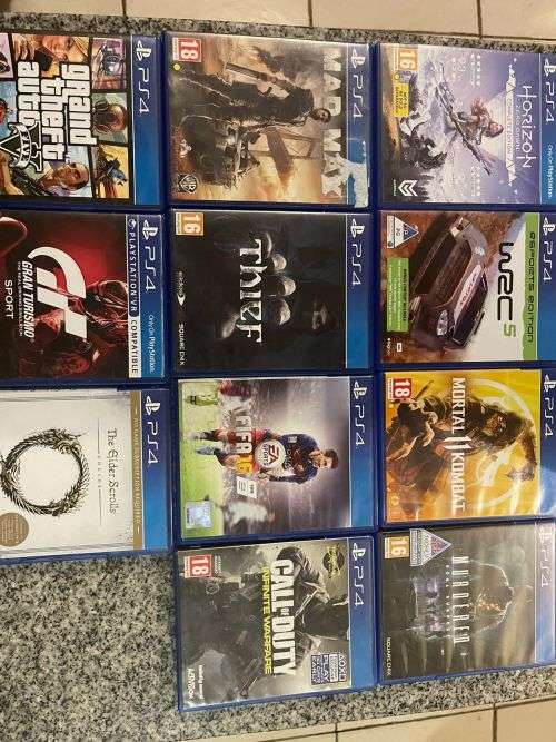 PLAYSTATION 4 PRO MINT CONDITION 1 TB WITH 2 CONTROLLERS CHARGING DOCK and 11 GAMES