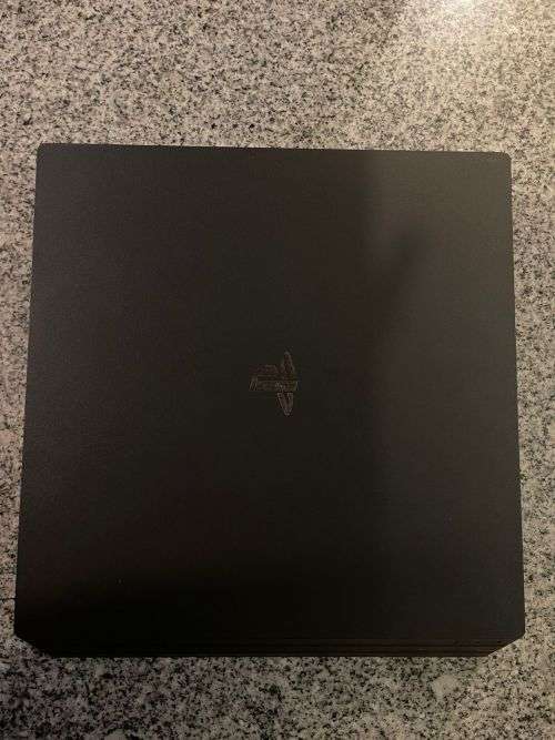 PLAYSTATION 4 PRO MINT CONDITION 1 TB WITH 2 CONTROLLERS CHARGING DOCK and 11 GAMES