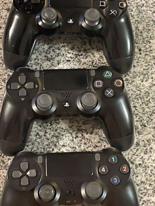 SONY PLAYSTATION 4 1TB  SLIM GOOD CONDITION  WITH 3 CONTROLLERS