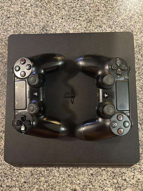 SONY PLAYSTATION 4 1TB  SLIM GOOD CONDITION  WITH 3 CONTROLLERS