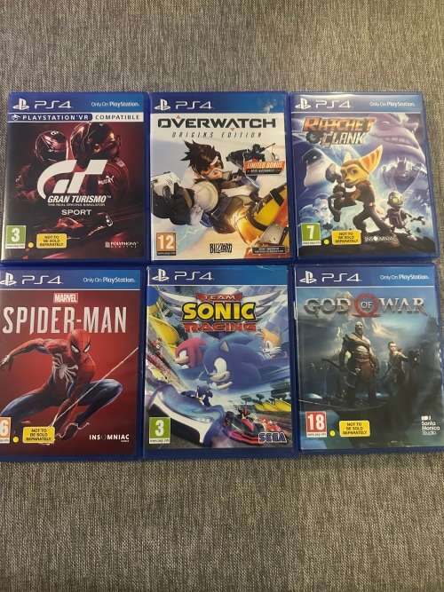 PLAYSTATION 4 SLIM 500GB WITH 6 GAMES and 2 CONTROLLERS