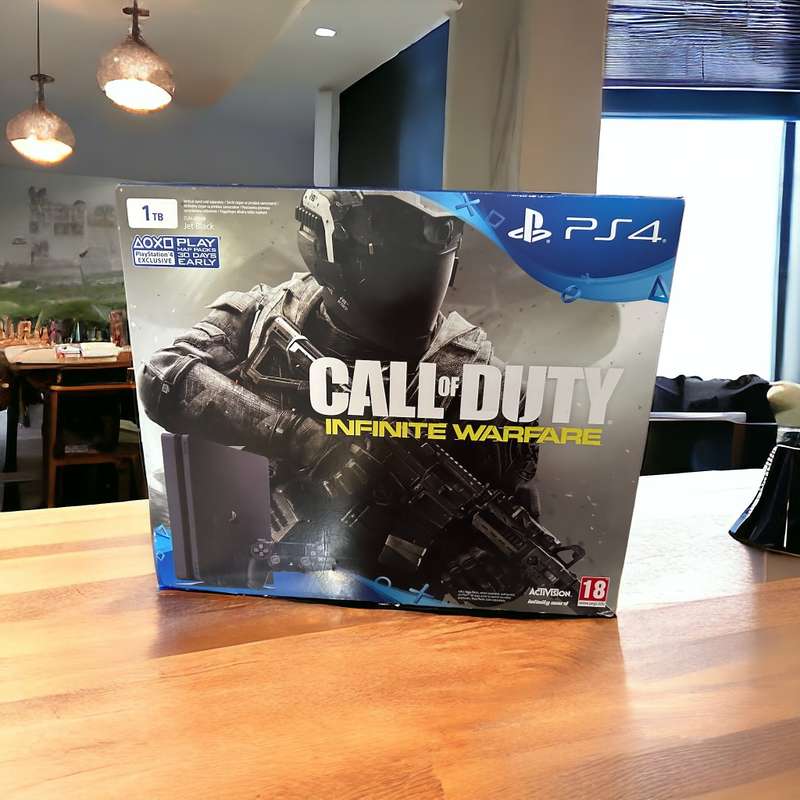 PLAYSTATION 4  SLIM 1TB 2 CONTROLLERS AND 14 GAMES  MINT AS NEW CONDITION IN BOX