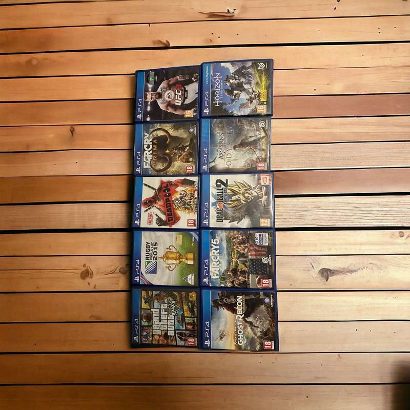PLAYSTATION 4  SLIM 500GB 10 GAMES WITH 2 CONTROLLERS MINT CONDITION