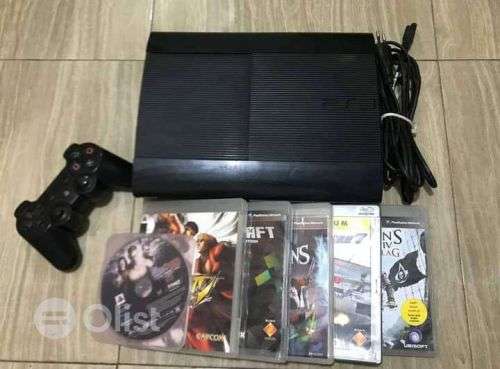 500GB SUPERSLIM PS3 WITH 5 DISC GAMES AND 40 GAMES ONBOARD WITH TWO GENERIC CONTROLS (NEW)-IN-BOX