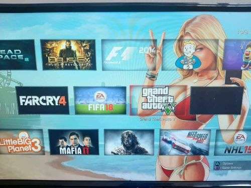 500GB SUPERSLIM PS3 WITH 5 DISC GAMES AND 40 GAMES ONBOARD WITH TWO GENERIC CONTROLS (NEW)-IN-BOX