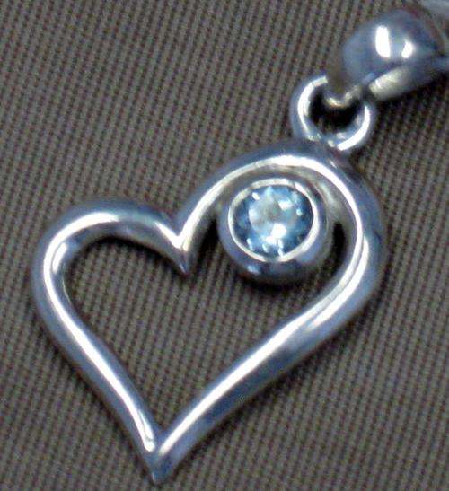 blue topaz pendant in sterling silver