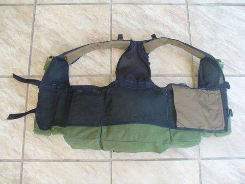 Former South African homelands battle jacket.  Bophuthatswana Defense Force green Battle Jacket. Difficult to find!  Bophuthatswana Defense Force was integrated into the SANDF after 1994.  Ammo mags NOT included, but the 2L water bottles ARE included!  Very difficult to find!!
