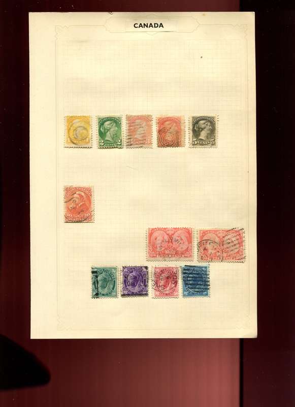Canada - 12 Stamps Mounted on Old Album Page