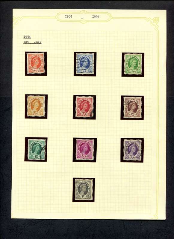 Rhodesia and Nyasaland - 10 Stamps Mounted (Hinged) On Old Album Page