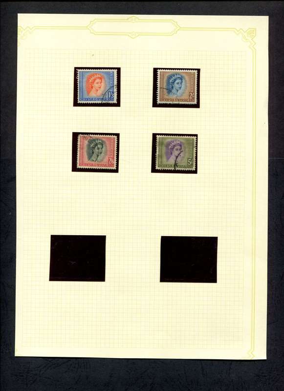 Rhodesia and Nyasaland - 4 Stamps Mounted (Hinged) On Old Album Page