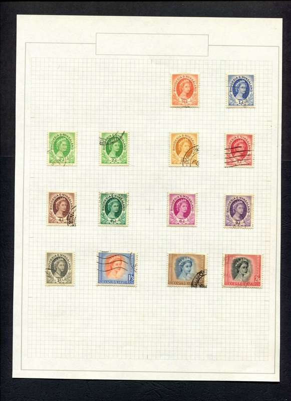 Rhodesia and Nyasaland - 14 Stamps Mounted On Old Album Page