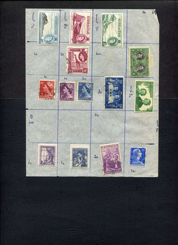 World Mix - 14 Stamps Mounted on Old Album Page