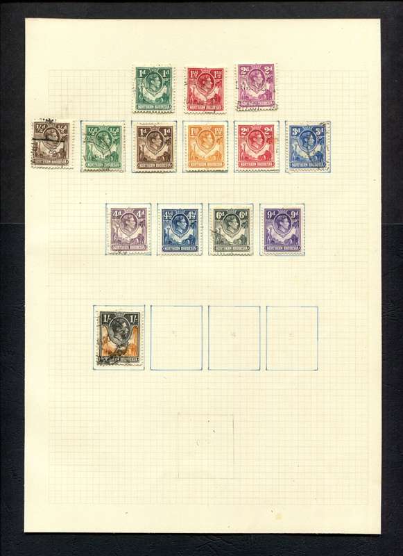 Northern Rhodesia - 14 Stamps  Mounted (Hinged) on Old Album Page