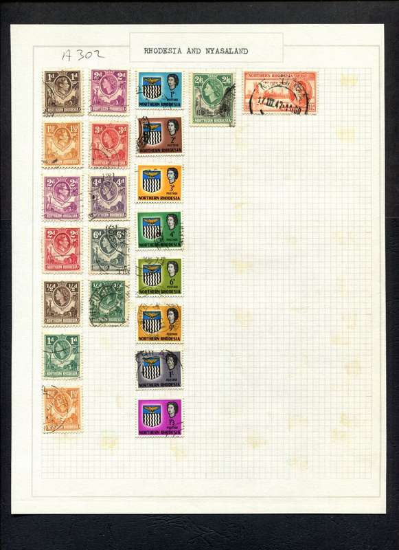 Northern Rhodesia - 22 Stamps Mounted (Hinged) on Old Album Page